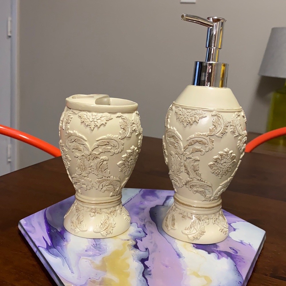 Nice soap/lotion dispenser and toothbrush holder